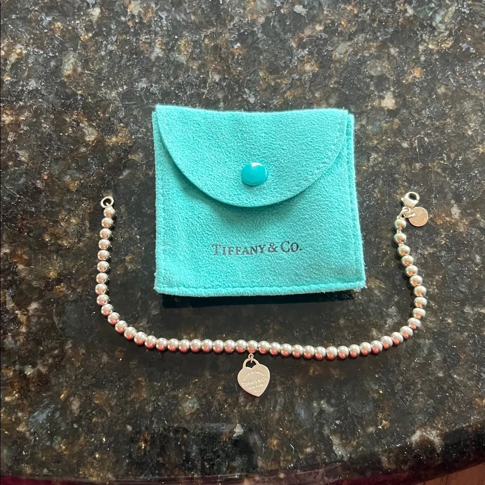 Auth Tiffany & Co. Silver Bead Bracelet with blue Heart Charm. 7.5 inches - Picture 2 of 2